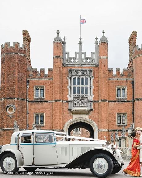 wedding car hire london retro wedding car white premium level against the background castle ancient building premiercarriage wedding car