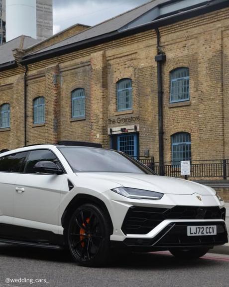 wedding car hire london white premium car porsche vintage building in the background wedding cars