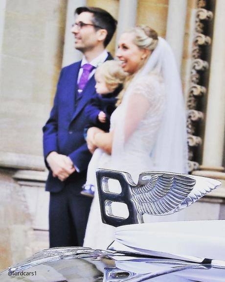 wedding car hire london brides with child in arms happy circle of premium retro wedding white car lordcars1