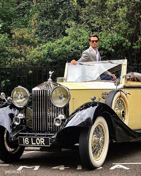 wedding car hire london groom sitting in premium retro car black with beige car lordcars1