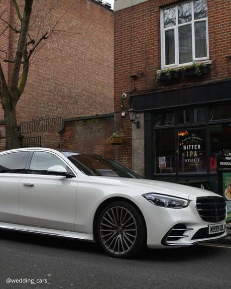 wedding car hire london white car premium modern round ancient building wedding cars