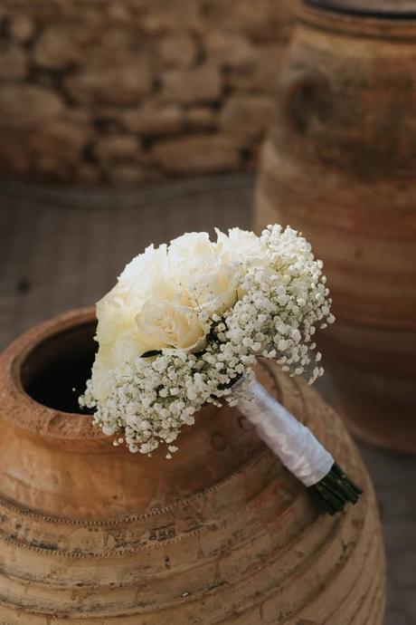 elegant-outdoor-wedding-with-candles-white-floral-details_16