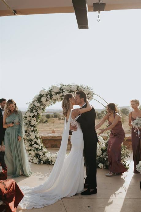 elegant-outdoor-wedding-with-candles-white-floral-details_27