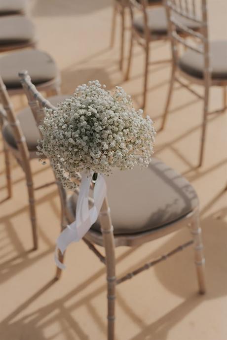 elegant-outdoor-wedding-with-candles-white-floral-details_20