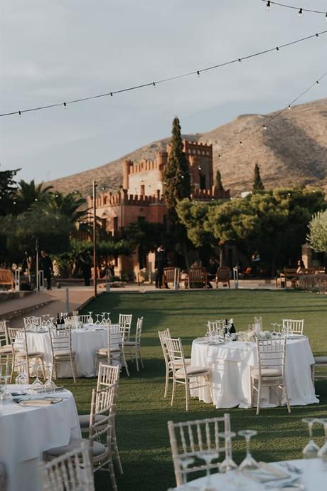 elegant-outdoor-wedding-with-candles-white-floral-details_29