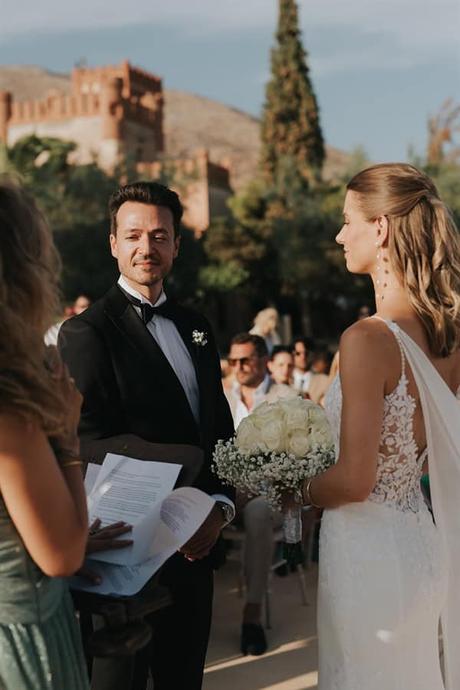 elegant-outdoor-wedding-with-candles-white-floral-details_26