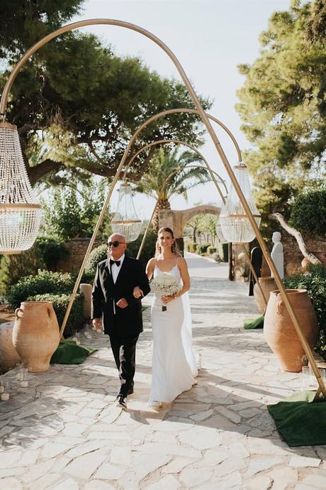 elegant-outdoor-wedding-with-candles-white-floral-details_24