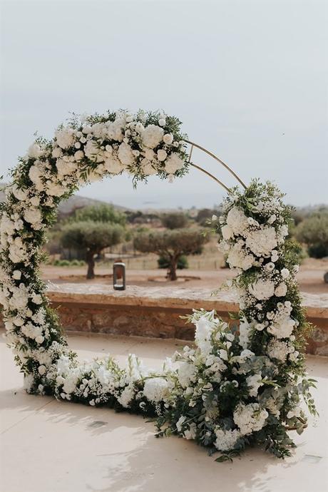 elegant-outdoor-wedding-with-candles-white-floral-details_18
