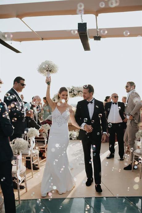 elegant-outdoor-wedding-with-candles-white-floral-details_28