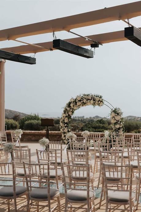elegant-outdoor-wedding-with-candles-white-floral-details_19