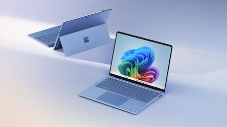 Windows 11 to Get AI-Powered Search Upgrade for Copilot+ PCs 1 Microsoft Surface Laptop and Surface Pro devices on a table.