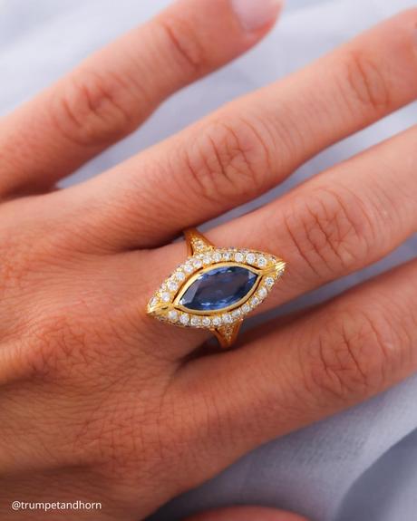 marquise engagement rings vintage yellow gold ring with halo and sapphire center stone trumpetandhorn