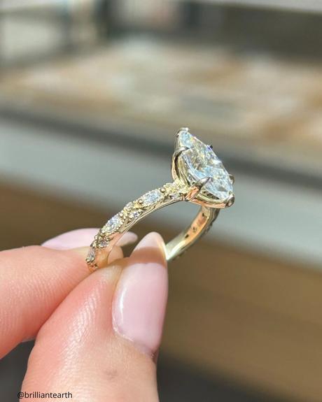 marquise engagement rings yellow gold ring side photo brilliantearth