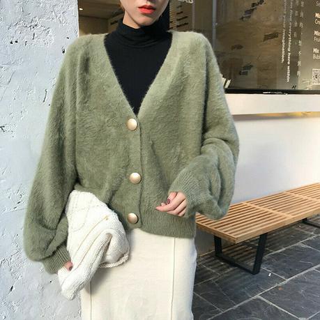 green cardigan sweater