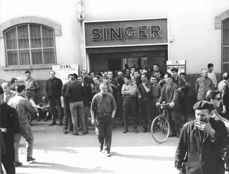 The sewing machines produced in the Singer factory in Monza (Italy) Workers on strike outside the Singer factory in Monza, 14th September 1965