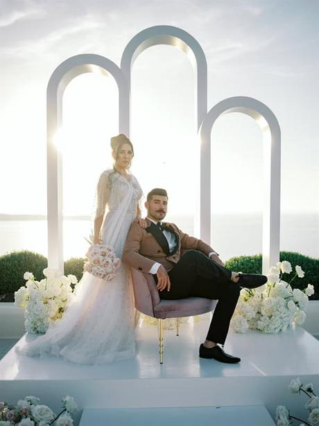 Blushing Blooms Breathtaking Views Fairytale Styled Shoot Santorini