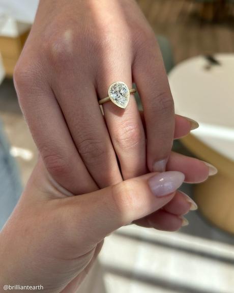 wedding ring finger yellow gold ring with pear cut diamond brilliantearth