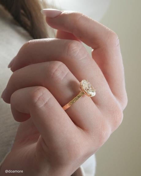 wedding ring finger yellow gold ring with oval cut diamond doamore