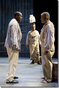 (L-R) James A. Williams (King Dick) and Dexter Zollicoffer (Deacon Simon) take part in a spirited conversation as Cedric Young (Governor, back) looks on.