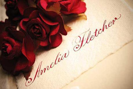 Autumn inspired wedding calligraphy in red with a natural texture