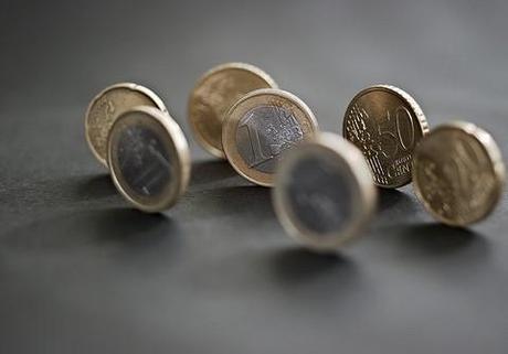 Eurozone crisis: Rescue deal halves Greek debt, boosts EFSF; reaction cautiously optimistic