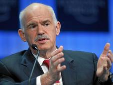 Greek Referendum Threatens Topple George Papandreou’s Government Merkel, Sarkozy Call Crisis Talks
