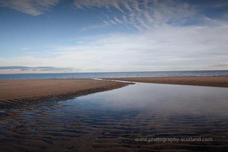 Landscape photo - clouds reflected at low tide on Portobello beach, Scotland