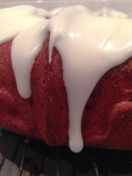 dripping cream cheese icing on red velvet cake