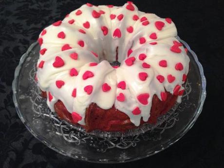 valentines day red velvet hidden heart design bundt cake with fondant shapes and cream cheese icing