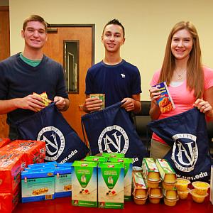 Volunteers from the City of Lancaster Youth Commission assemble care packages - courtesy City of Lancaster