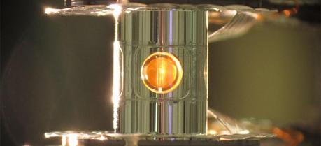 A metallic case called a hohlraum holds the fuel capsule for NIF experiments. Target handling systems precisely position the target and freeze it to cryogenic temperatures (18 kelvins, or -427 degrees Fahrenheit) so that a fusion reaction is more easily achieved