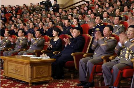 Kim Jong Un and his wife Ri Sol Ju (4th R) attend a concert by the Merited State Choir at the People's Theater in Pyongyang (Photo: Rodong Sinmun).