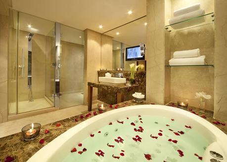 Romantic bathroom with a rose pedal tub