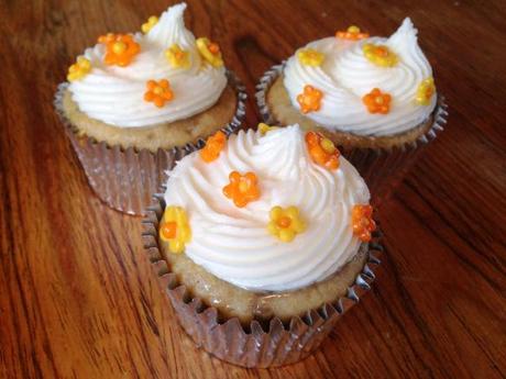 banana and salted caramel birthday cupcakes with spring orange and yellow flowers recipe