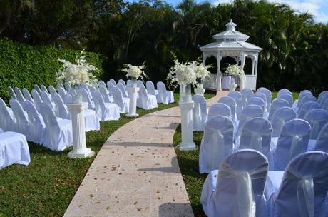 All white wedding aisle and altar decor