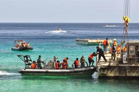 asylum seeker dies in Manus Island ... something on Papua New Guinea