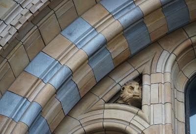 An abundance of animals An animal head peeps out from within the arched main entrance doorway.