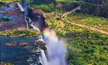 Africa’s Private Islands: Barefoot in Paradise Rainbow over Victoria Falls in Zimbabwe, Africa - Africa Safari and Seychelles Tour