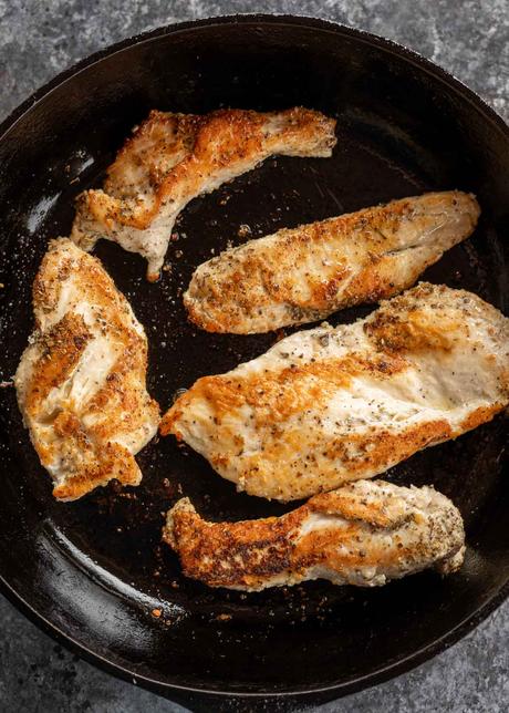 Pesto Chicken Gnocchi pan seared chicken breasts in cast iron