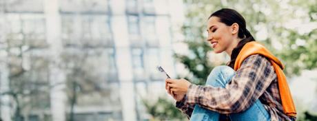 Text a Psychic: Get Instant Guidance Through Your Phone woman texting a psychic