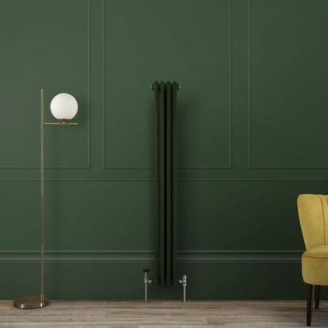 The 10 best column radiators for traditional and modern homes Milano Windsor green vertical traditional double column radiator on green wall nearby yellow chair and tall white lamp fitting