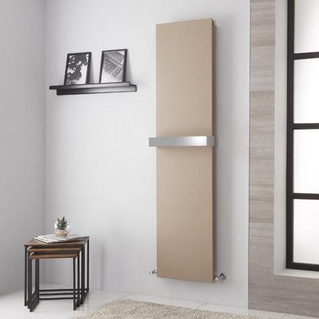 A guide to radiator repair and replacement costs Lazzarini Way Ischia mineral quartz vertical designer radiator on light wall nearby small table and shelf with framed artwork
