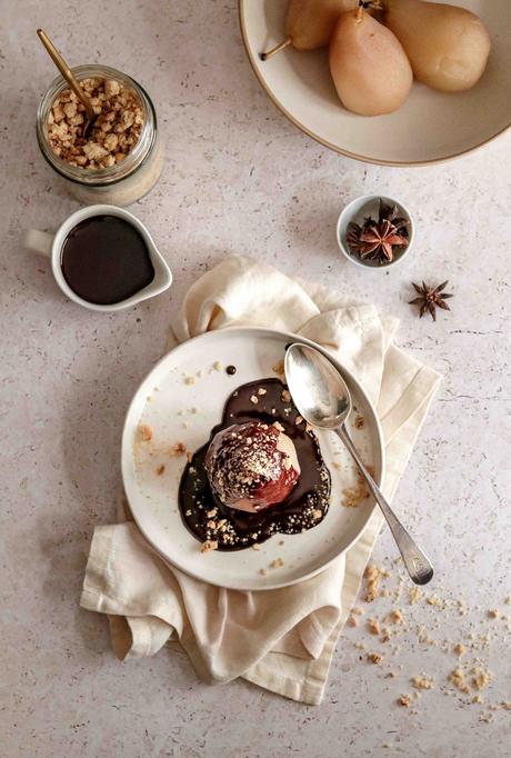 Poached pears with chocolate sauce and hazelnut crumb Poached pears with chocolate sauce and hazelnut crumb