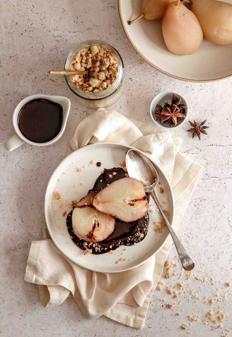 Poached pears with chocolate sauce and hazelnut crumb Poached pears with chocolate sauce and hazelnut crumb