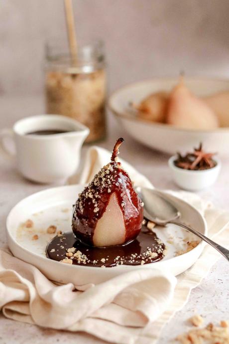 Poached pears with chocolate sauce and hazelnut crumb Poached pears with chocolate sauce and hazelnut crumb