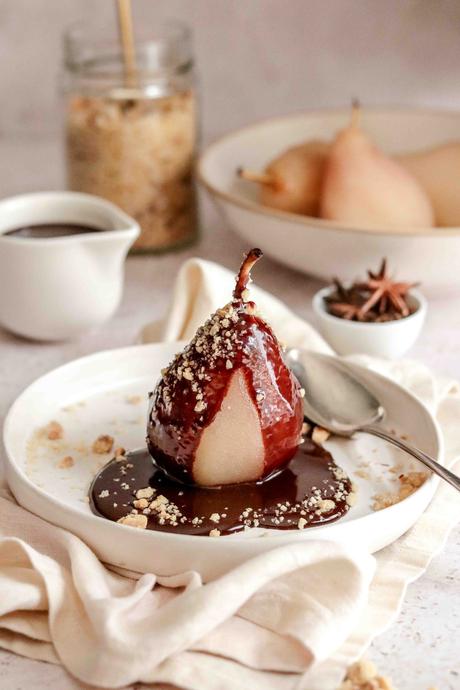 Poached pears with chocolate sauce and hazelnut crumb Poached pears with chocolate sauce and hazelnut crumb