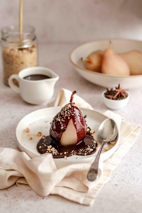 Poached pears with chocolate sauce and hazelnut crumb Poached pears with chocolate sauce and hazelnut crumb