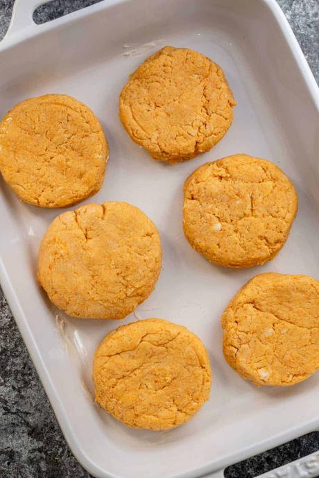 patted out pumpkin biscuits in a baking dish