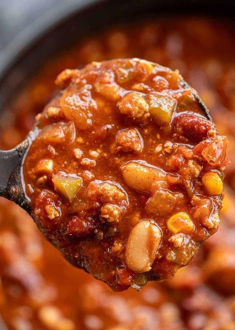 Chili Turkey Recipe a closeup shot of a ladle of turkey chili