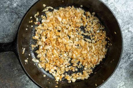 Broccoli Pasta chopped onions in a skillet